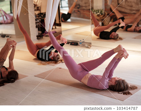 workshop of air yoga and stretching in yoga studio workshop of air yoga and stretching in yoga studio 103414787