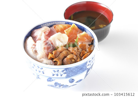 Seafood rice bowl with tuna, salmon, sea bream, scallop, and sea urchin and red miso soup 103415612