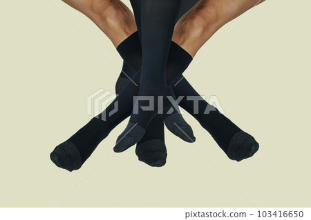 legs wearing black compression socks 103416650