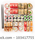 Big colorful sushi set on a white background. Top view. 103417755