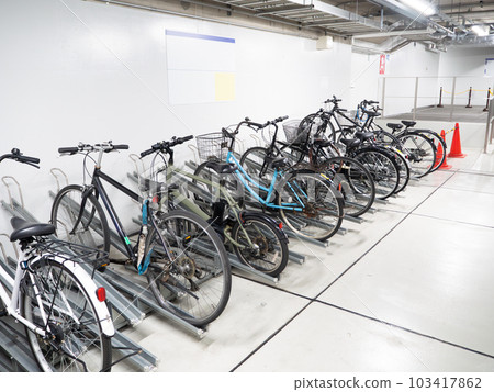 Bicycles parked in an underground bicycle parking lot Bicycles parked in an underground bicycle parking lot 103417862