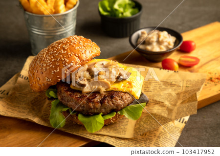 Beef cheese and mushroom Burger Served with sauce, salad, potato Beef cheese and mushroom Burger Served with sauce, salad, potato 103417952