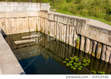 Reinforced concrete structure of the water intake on the river Protva, Russia Reinforced concrete structure of the water intake on the river Protva, Russia 103419580