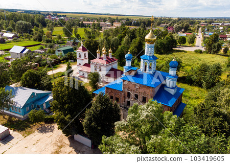 Top view of ancient Orthodox churches in the village of Trubino, Russia 103419605