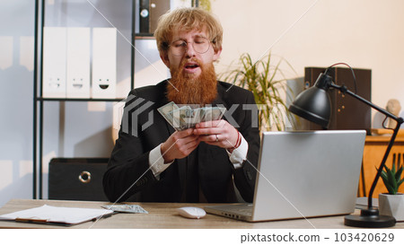 Rich pleased boss businessman waving money dollar cash, success career lottery winner, income wealth 103420629