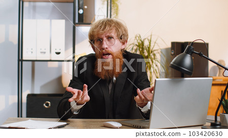 Confused businessman embarrassed about ambiguous question, having doubts, no answer idea, clueless 103420630