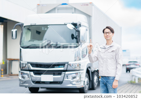 Young man delivering by lorry 103420852