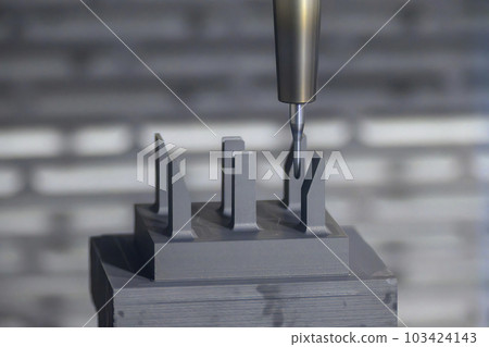 The CNC milling machine finish cutting the graphite electrode parts with solid ball end mill. 103424143
