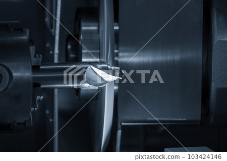 Close up scene the drill tool regrinding process with abrasive disc. Close up scene the drill tool regrinding process with abrasive disc. 103424146