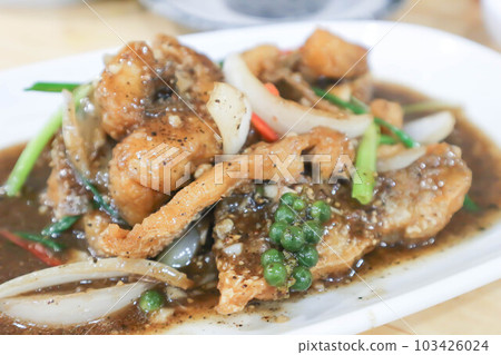 stir fried fish with vegetableor fried fish in gravy stir fried fish with vegetableor fried fish in gravy 103426024