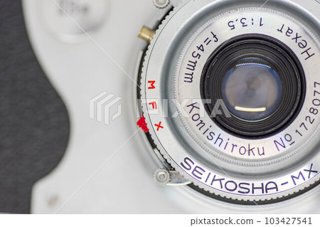 Contact switching on the side of the lens of a film camera Contact switching on the side of the lens of a film camera 103427541