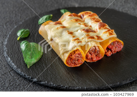 Bolognese Cannelloni with mozzarella Bolognese Cannelloni with mozzarella 103427969