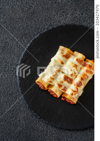 Bolognese Cannelloni with mozzarella Bolognese Cannelloni with mozzarella 103427970