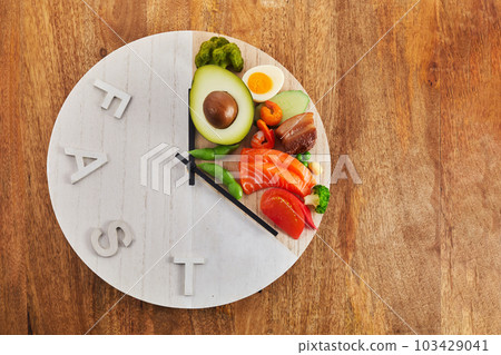Intermittent fasting. Healthy breakfast, diet food concept. Organic meal. Fat loss concept. Intermittent fasting. Healthy breakfast, diet food concept. Organic meal. Fat loss concept. 103429041