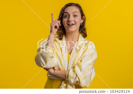 Inspired young woman having good idea, plan, startup, showing inspiration motivation Eureka gesture Inspired young woman having good idea, plan, startup, showing inspiration motivation Eureka gesture 103429124