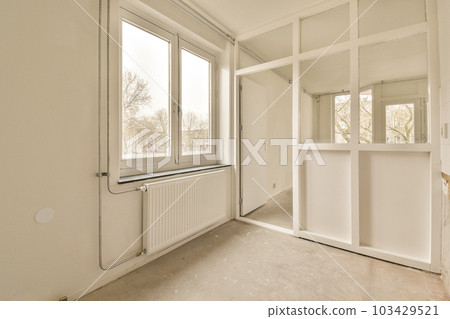 an empty room that is being renovated and ready to be used as a new home or apartment for the future 103429521