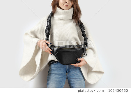Woman with Leather Shoulder Bag with Braided Strap Woman with Leather Shoulder Bag with Braided Strap 103430460