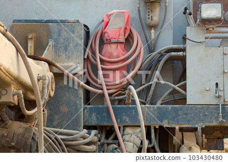 Powerful Hydraulic Drill for Construction Site Work Heavy Equipment Machine Close-up industrial background. 103430480