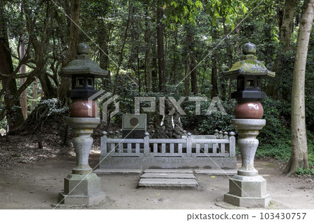 Sazare stone surrounded by a granite fence in the grounds of Kashima Shrine Sazare stone surrounded by a granite fence in the grounds of Kashima Shrine 103430757