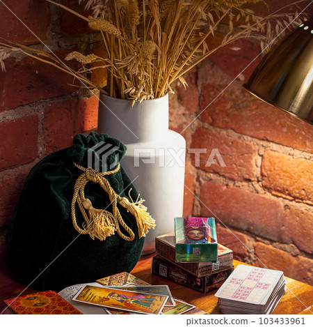 Blurred Tarot cards layout on witch table.Fortune telling and astrology, Blurred Tarot cards layout on witch table.Fortune telling and astrology, 103433961