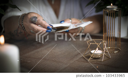 Concept of psychic advisor or ways of divination with cards. 103433965