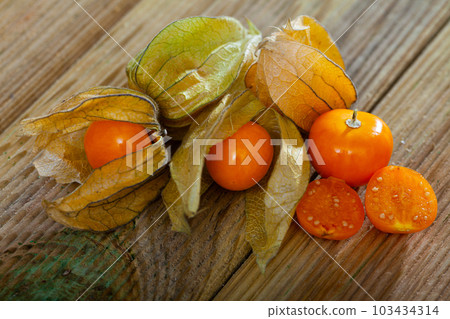 Cape gooseberry physalis on wooden background 103434314