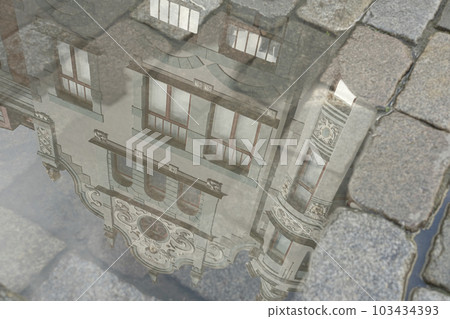 Estonia Tallinn Building reflected in a puddle 103434393