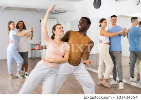 Adult male and young girl dancing pair dance Adult male and young girl dancing pair dance 103434554