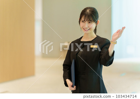 Portrait of female guide staff 103434714