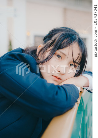 high school girl looking at camera 103437041