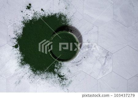 Blue-green algae Chlorella and spirulina powder in bowl. Super powder. Natural supplement of algae. Detox superfood drink cocktail. Food supplement source of protein and beta carotene 103437279