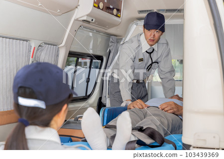 Ambulance image of paramedics 103439369