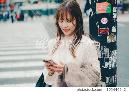 Taiwanese woman walking at the crossroads Taiwanese woman walking at the crossroads 103440342