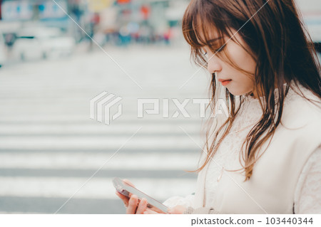 Taiwanese woman walking at the crossroads Taiwanese woman walking at the crossroads 103440344