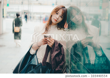 Taiwanese woman waiting Taiwanese woman waiting 103440554