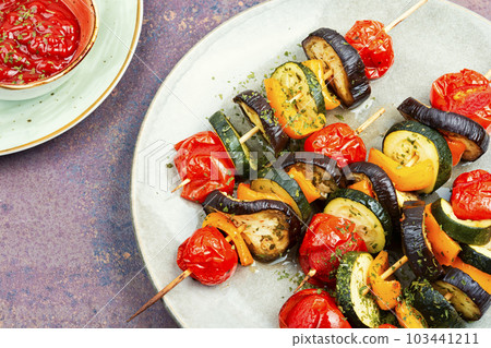 Vegetable skewers on wooden skewers. Vegetable skewers on wooden skewers. 103441211