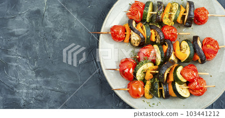Plate with tasty vegetable skewers. Plate with tasty vegetable skewers. 103441212