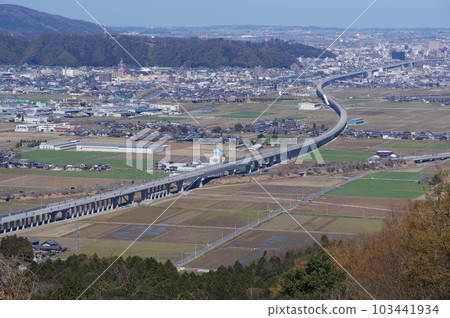 View from Mt. Monju towards the center of Fukui City Hokuriku Shinkansen under construction March 2023 View from Mt. Monju towards the center of Fukui City Hokuriku Shinkansen under construction March 2023 103441934