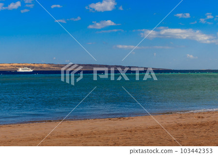 White yacht sailing in Red sea, Egypt White yacht sailing in Red sea, Egypt 103442353