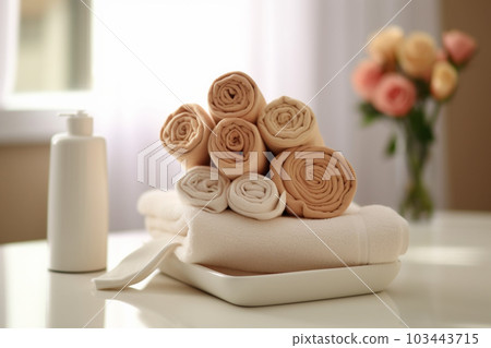 spa towels arranged on white tray with a bouquet of flowers Generative AI 103443715