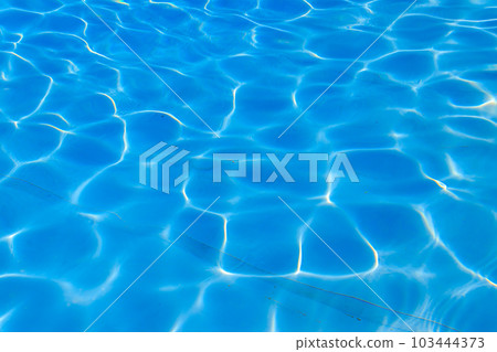 Texture of water in swimming pool for background. Surface of blue swimming pool 103444373