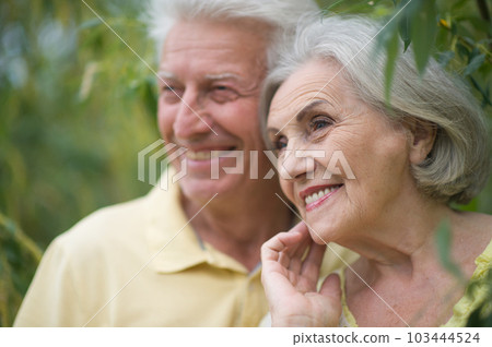Happy senior couple in love. Park outdoors. 103444524