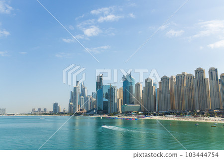 Dubai city - amazing city center skyline at suny day, United Arab Emirates 103444754
