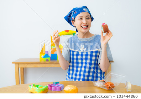 Nursery school teacher production shop and play 103444860