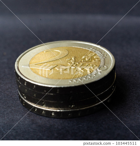 Euro close up photo. Macro coins. Soft focus, dark background Euro close up photo. Macro coins. Soft focus, dark background 103445511