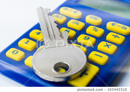 The calculator and home key macro closeup, white background The calculator and home key macro closeup, white background 103445528