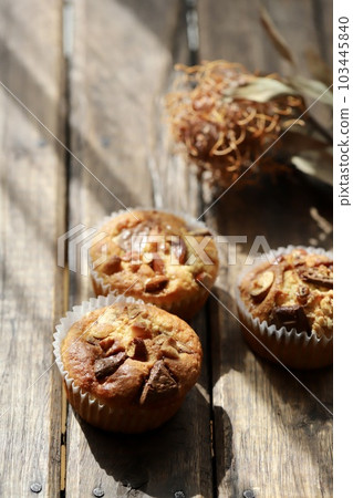 Homemade nutty chocolate muffins 103445840