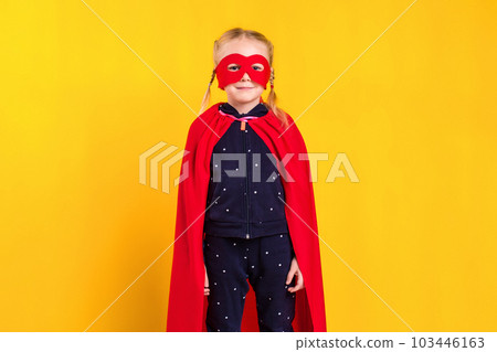 Superhero little girl in a red raincoat and a mask Superhero little girl in a red raincoat and a mask 103446163