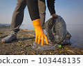 Garbage collection on the beach. Ecology concept. Close-up view.  103448135