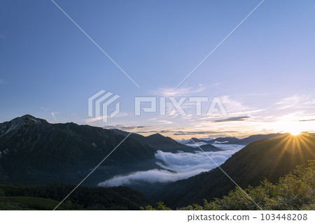 Climbing through the Northern Alps in summer Climbing through the Northern Alps in summer 103448208